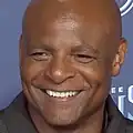 Headshot of Warren Moon smiling