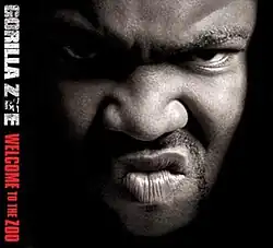 The cover features a close-up photo of an angry Gorilla Zoe. Both the artist's logo and album title are vertically placed on the left side of the cover, colored in white and red respectively.