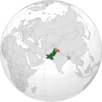 Location of West Pakistan (dark green)[a], the rest of Pakistan (light green)[b] and territories claimed by the federal government (pink)[c]