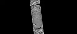 CTX camera (on Mars Reconnaissance Orbiter) image of Escalante Crater. Dunes are visible near the bottom of the image.