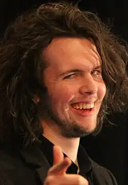 William Pugh, pointing and smiling