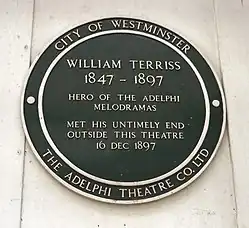 The plaque reads: "William Terriss: 1847–1897. Hero of the Adelphi Melodramas. Met his untimely end outside this theatre 16 Dec 1897.