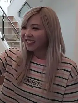 photograph of yvonnie talking to someone in the offline tv house