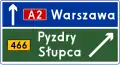 E-2c "signpost board on the motorway, placed next to the carriageway" (Direction sign; exit sign, stack type)